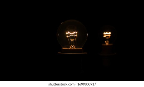 Two lightbulbs in the dark
