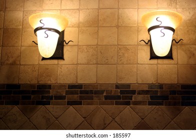 two lights on a wall.
