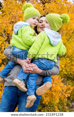 Similar – Two children laughing while playing in the playground.