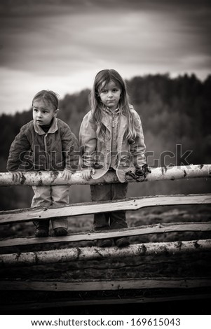 Similar – Mother with her seven year old daughter laughing in a cabin in the countryside.