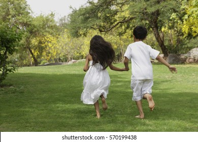 two little children running away