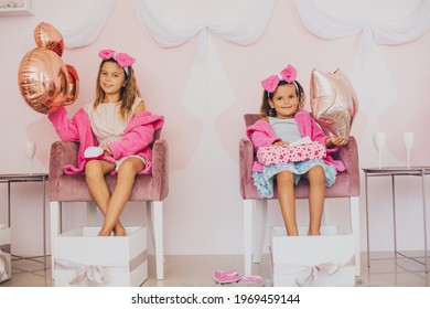 Two Little Girls Having Party In Spa Center. Day For Pedicure.