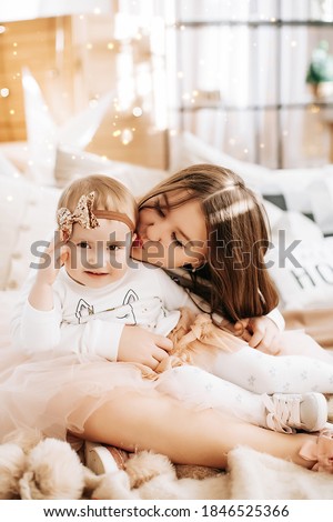 Similar – Image, Stock Photo happy mother and 9 month old baby in matching pajamas