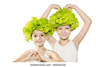 Two Little Girls With Lettuce Hair Holding Hands In Heart Shape. Healthy Lifestyle, Kids Love Veggie, Vegetarian Food Concept. Isolated