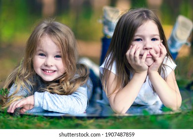 13,849 Two girls lying on grass Images, Stock Photos & Vectors ...