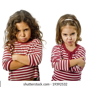 two little girls  in quarrel isolated on white