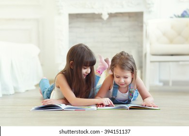 Two Little Girls Sisters Reading