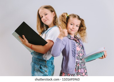 Multicultural Pupils Holding Laptops Looking Camera Stock Photo ...