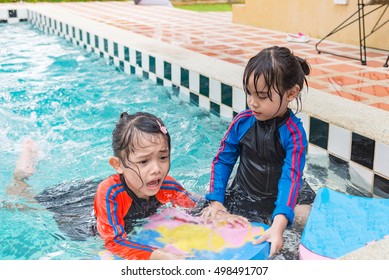 Little Girl Rainbow Swimsuit Sits On Stock Photo (Edit Now) 2078555848