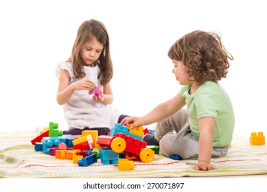 Two Little Kids Playing With Bricks Home Isolated On White Background