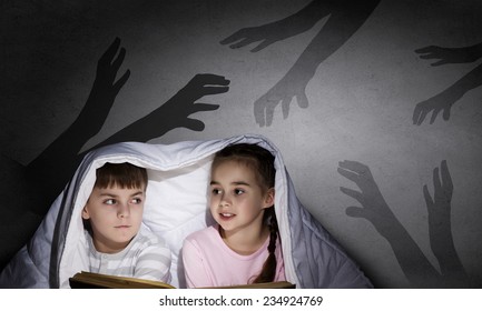 Two Little Kids Reading Book Under Stock Photo 232274701 | Shutterstock