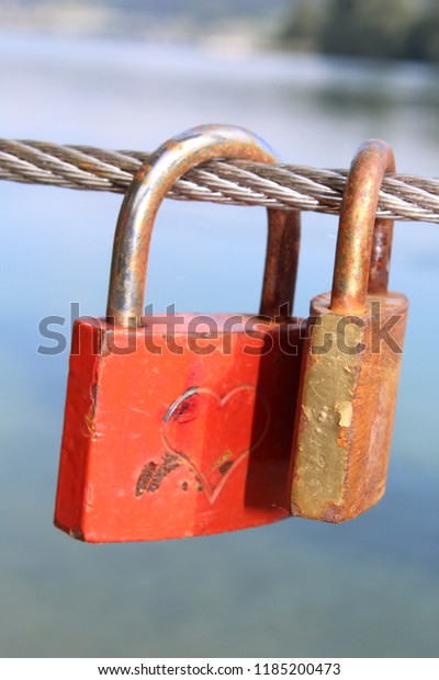 two locks love
forever bridge water
background