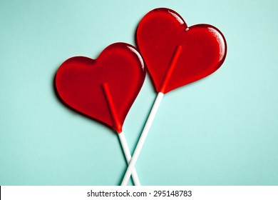 Two lollipops. Red hearts. Candy. Love concept. Valentine day. 