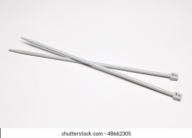 Two Long Knitting Needles Isolated On White Background