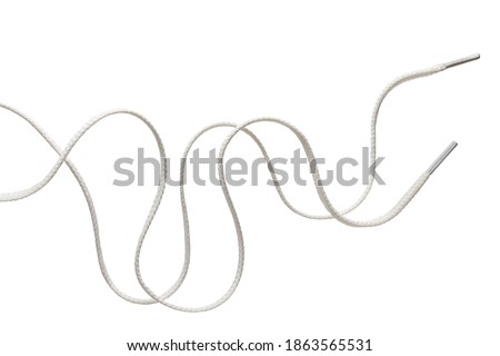 two long unbound white shoe laces isolated on white 