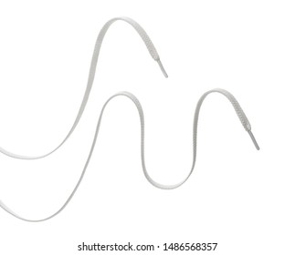 two long white textile shoelaces, hanging in the air, isolated on white background