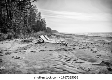 Two Lounge Chairs On An Empty Beach On The Baltic Sea