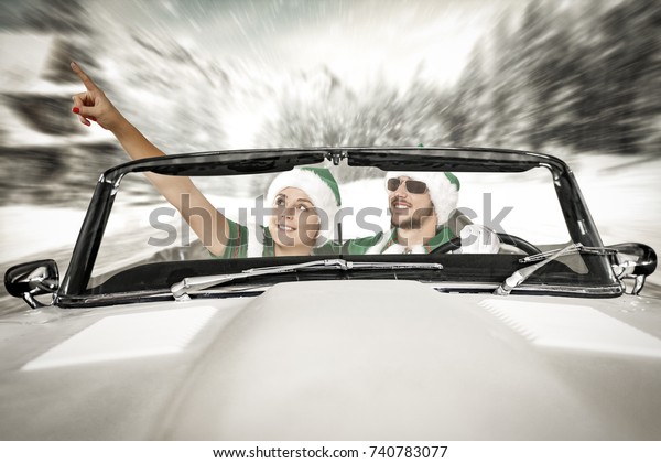 two lovers in car and\
winter road 