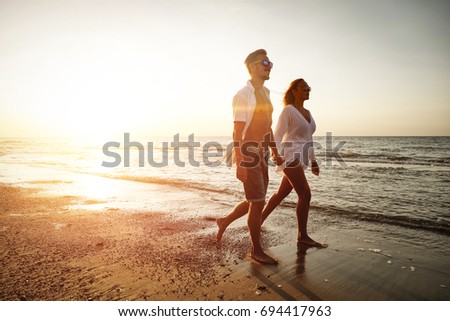 two lovers on beach and summer time 