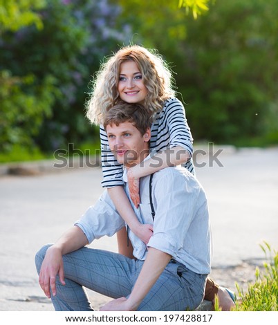 Similar – Image, Stock Photo Studio portrait of a young couple hugging