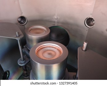 Two magnetron sputtering sources with two inch copper and titanium targets