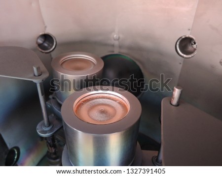 Two magnetron sputtering sources with two inch copper and titanium targets