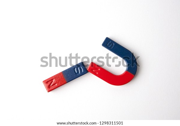 Two magnets on white background