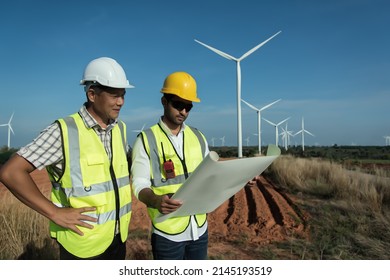 Two maintenance  planning  discuss Project in wind turbine farm.