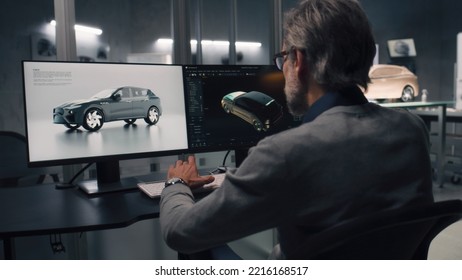 Two Male Automotive Designers Working On Model Of Eco Friendly Electric Car In Modern Car Design Studio. One Working In 3D Modeling Computer Software, Other Sculpting With Plasticine Clay And Rake.