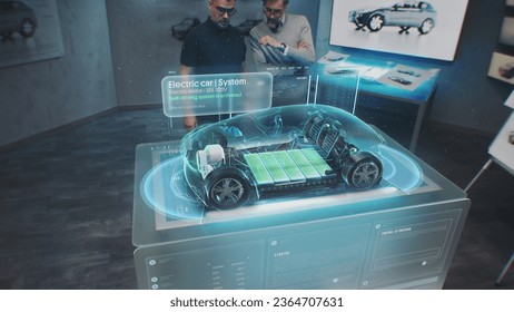 Two male automotive engineers develop new eco-friendly electric car using futuristic augmented reality holographic automobile prototype. 3D graphics of vehicle high-tech developing. VFX animation. - Powered by Shutterstock