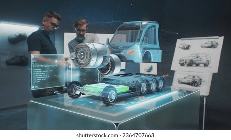 Two male automotive engineers develop new eco-friendly truck with electric engine using tablet computer and augmented reality hologram. 3D graphics of vehicle high-tech developing. VFX animation. - Powered by Shutterstock