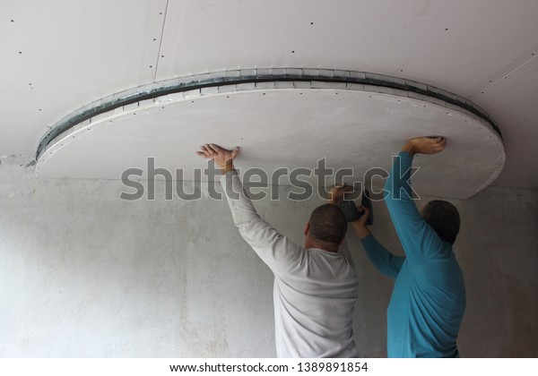 Two Male Builders Install Figured Element Stock Photo Edit Now