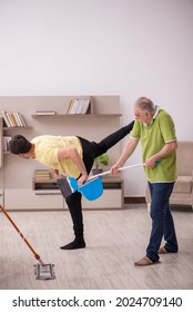 Two Male Contractors Cleaning The House