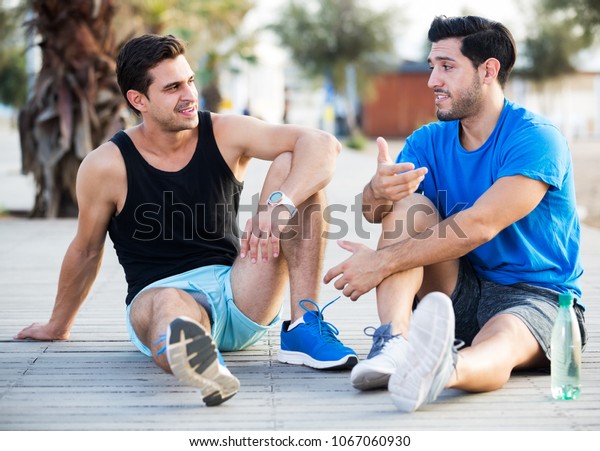 Two Male Friends Resting After Training Stock Photo 1067060930 ...