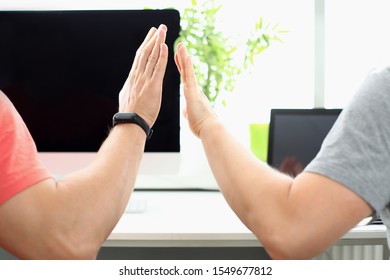 Two Male Hand In Office Hive Five. Business Startup Concept