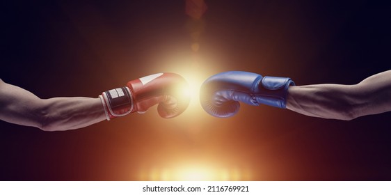 Two male hands in boxing gloves. Sports confrontation. 