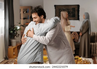 Two Male Muslims Greeting Each Other - Powered by Shutterstock