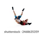 Two male wrestlers engage in battle, showing strength and skills during competition isolated on white background. Concept of combat sport, martial arts, competition, tournament, athleticism