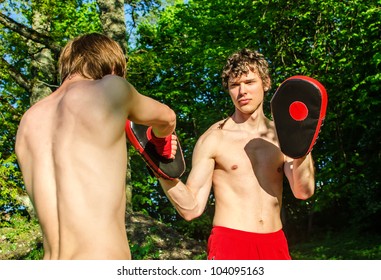 Two Man Training Muay Thai In Forest