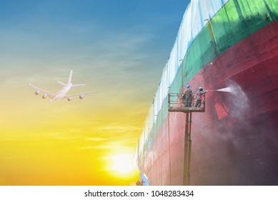 Two man worker by high pressure water jet to cleaning with Old cargo ship under repair coating painting in shipyard