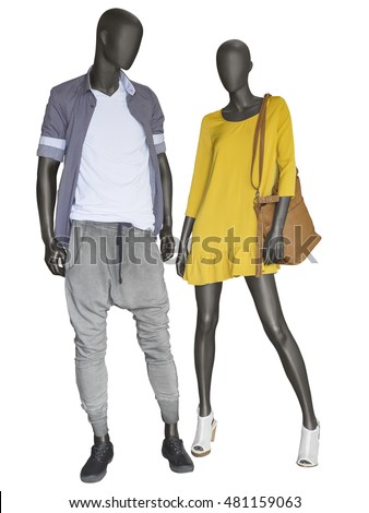 Two mannequins, male and female, dressed in casual clothes. Isolated on white background. No brand names or copyright objects.