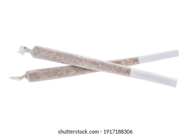 Two marijuana joints isolated on white background