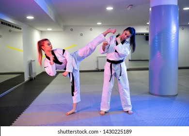 Two martial artists preparing for the competition and training hard - Powered by Shutterstock