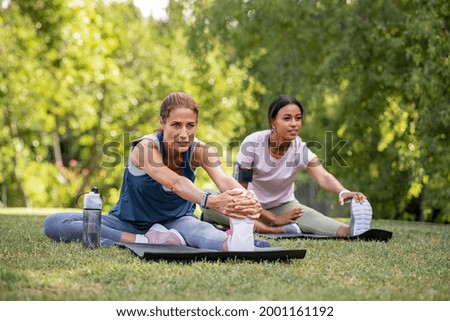 Similar – woman doing yoga by swimming pool. Yoga and mindfulness