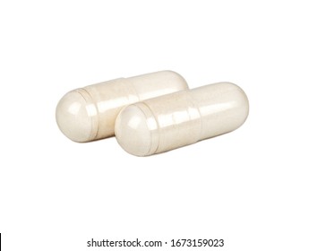 Two medical capsules isolated on a white background