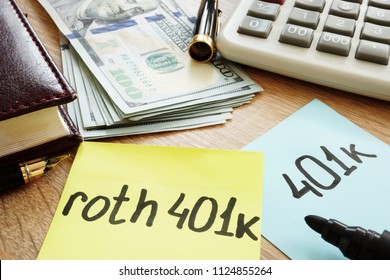 Two Memo Sticks Roth 401k On A Desk. Retirement.