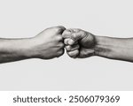 Two men bumping fists isolated on white background. The touch of a person