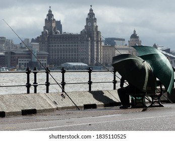 Two Men Fishing The River Mersey