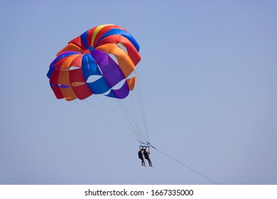 Two men parasailing in Nerja Malaga Spain