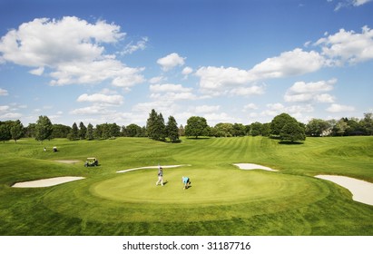 Two Men Playing Golf